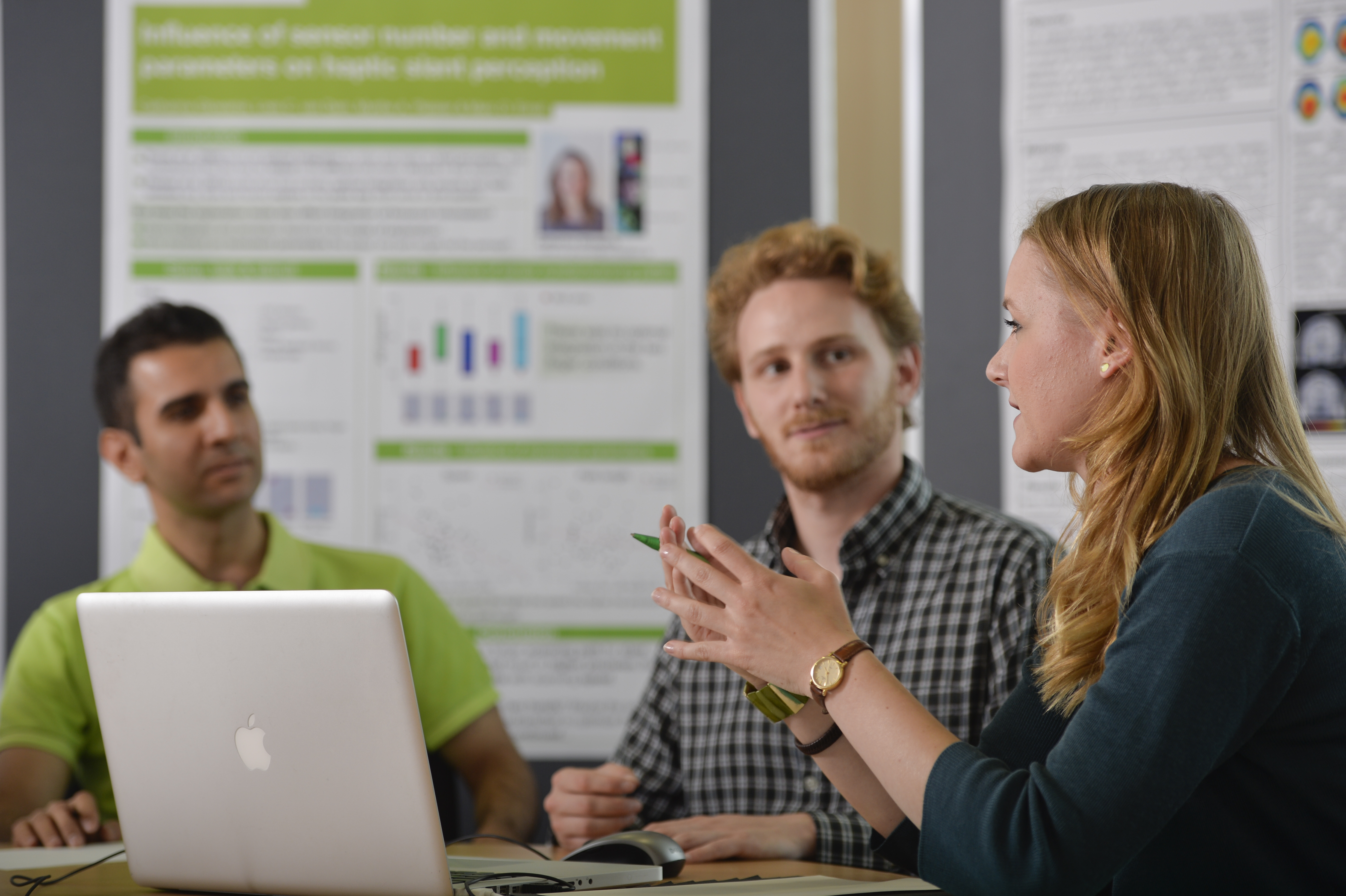 Two young researchers discussing.