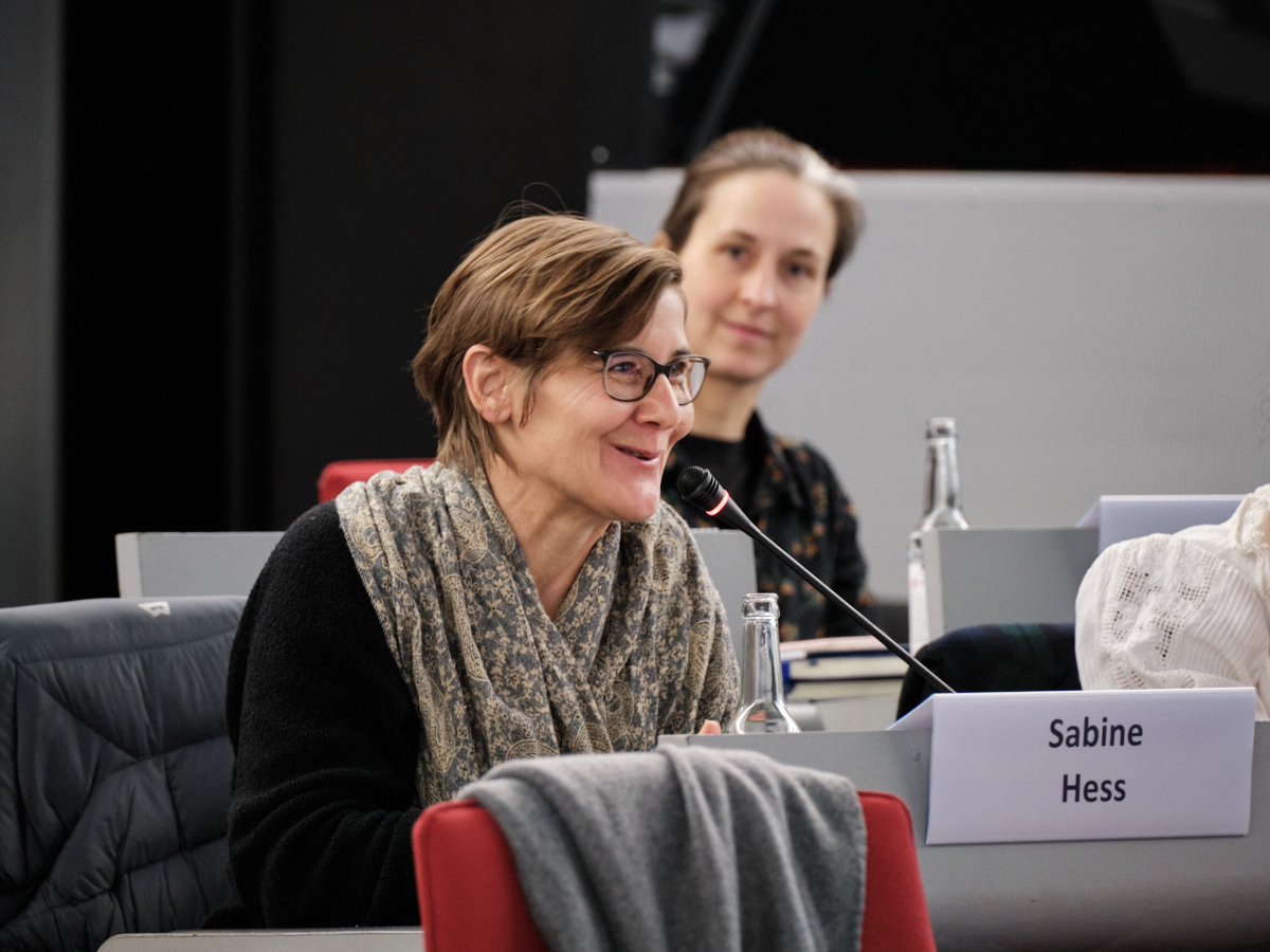 Photo of Sabine Heß in the audience, one of the convenors of the research group